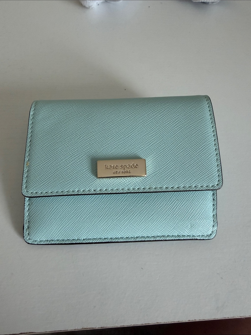 kate spade mint green saffiano leather bifold wallet with gold plaque